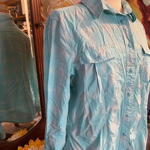 Very fresh and light fabric.  Button down shirt.  Beautiful